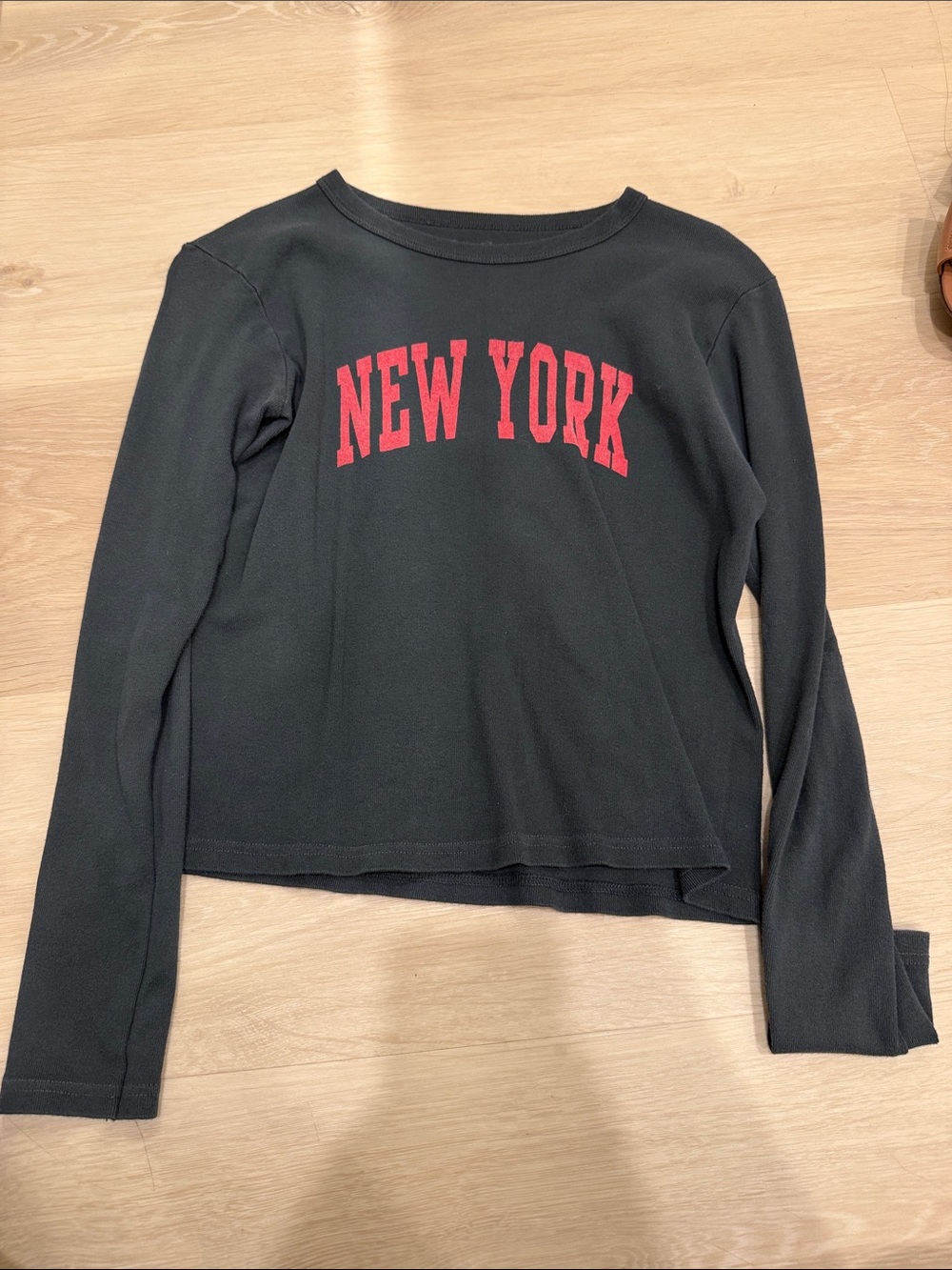 Brandy Melville Black Long-Sleeve Crewneck Top with Red "New York" Graphic
